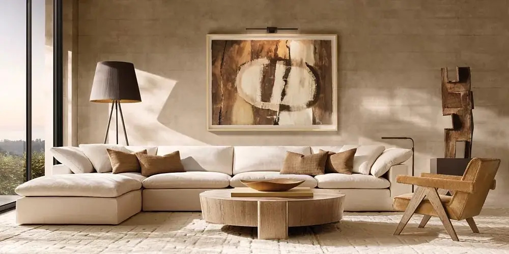 spacious living room featuring a large, colorful painting prominently displayed on the wall